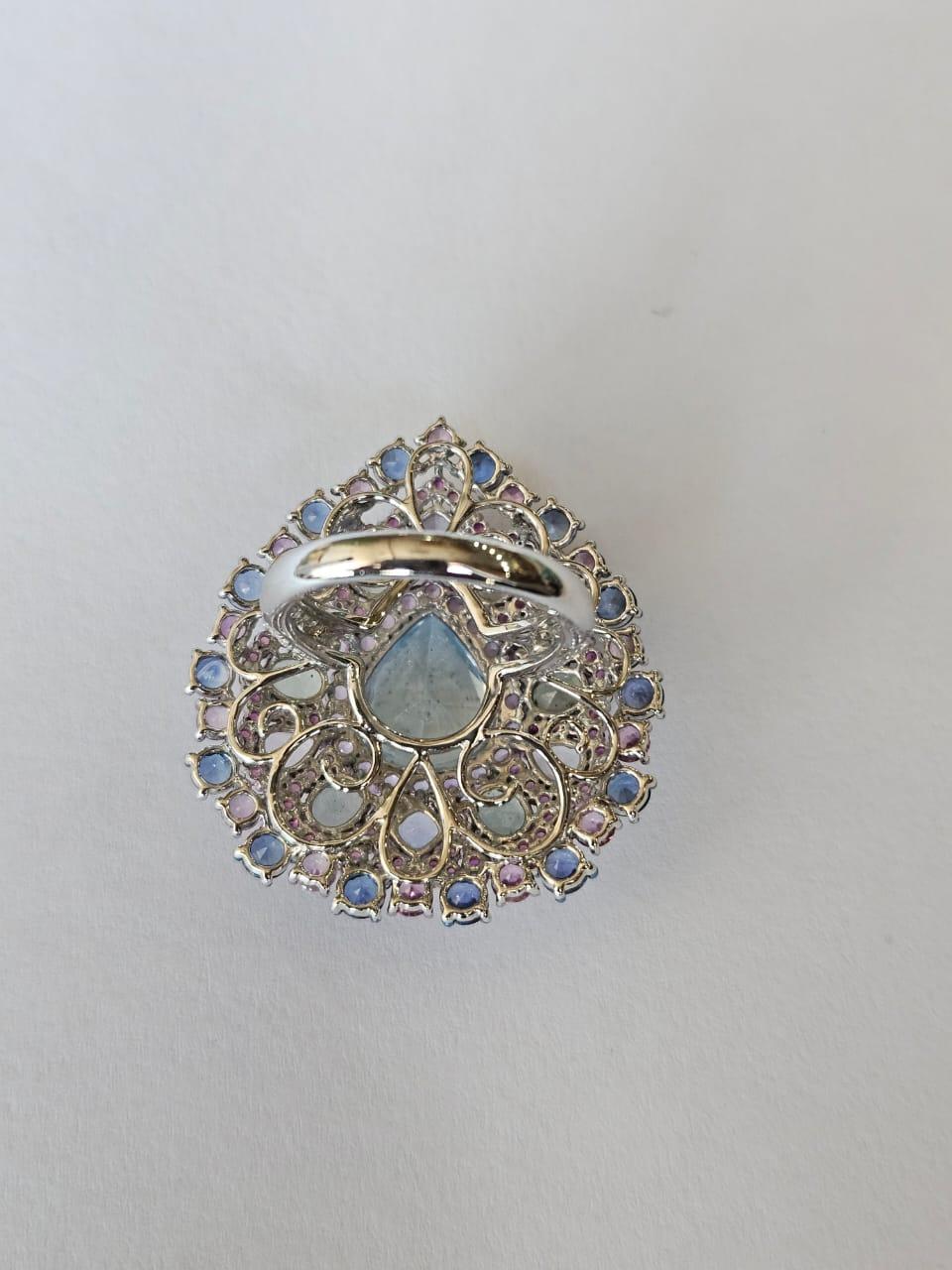 Pear Cut Set in 18K Gold, 4.89 carat Aquamarine, Multi Sapphires & Diamonds Cocktail Ring For Sale