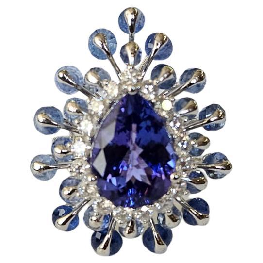 Set in 18K Gold, 5.33 carats Tanzanite, Blue Sapphires 
Diamonds Cocktail Ring For Sale