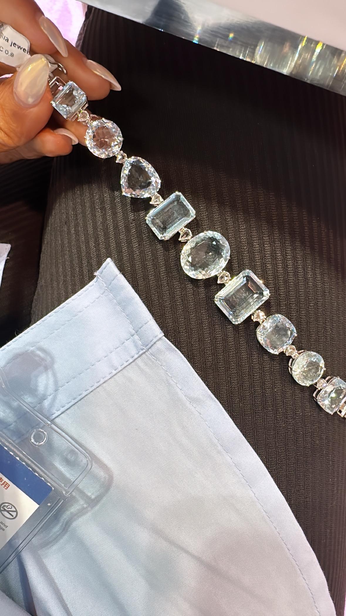 Bracelet tennis en or 18 carats, aigue-marine naturelle de 57,57 carats et diamants en vente 1