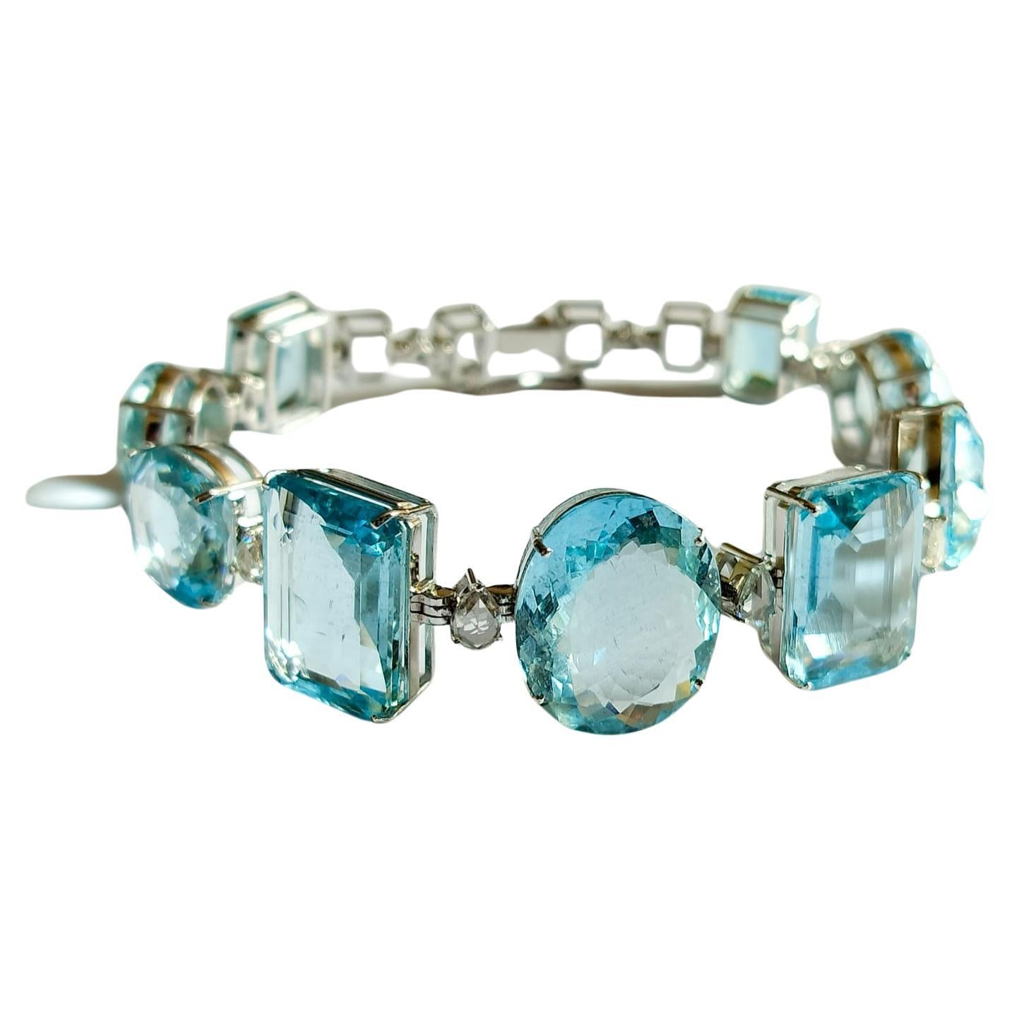 Bracelet tennis en or 18 carats, aigue-marine naturelle de 57,57 carats et diamants