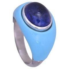 Anello da cocktail con cabochon di tanzanite e fascia di turchese, 5,79 carati, incastonato in oro 18 carati Anello da cocktail con cabochon di tanzanite e fascia di turchese, 5,79 carati, incastonato in oro 18 carati