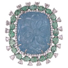 Set in 18K Gold, 63.97 carat carved Aquamarine, Emeralds & Diamond Cocktail Ring
