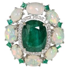 Set in 18K Gold, 6.43 carat Emeralds, Ethiopian Opal & Diamond Engagement Ring