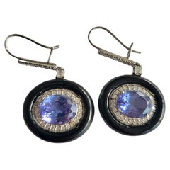 Set in 18k Gold, 6.43 Carats, Tanzanite, Diamonds & Black Enamel Dangle Earrings