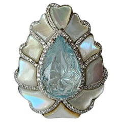Set in 18K Gold, 6.45 carats, carved Aquamarine, Pearls & Diamonds Cocktail Ring