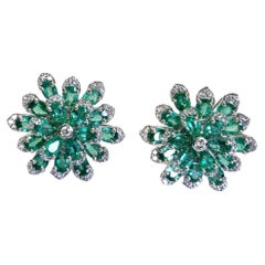 Set in 18K Gold, 6.63 Carats, Natural Zambian Emerald 
Diamonds Stud Earrings