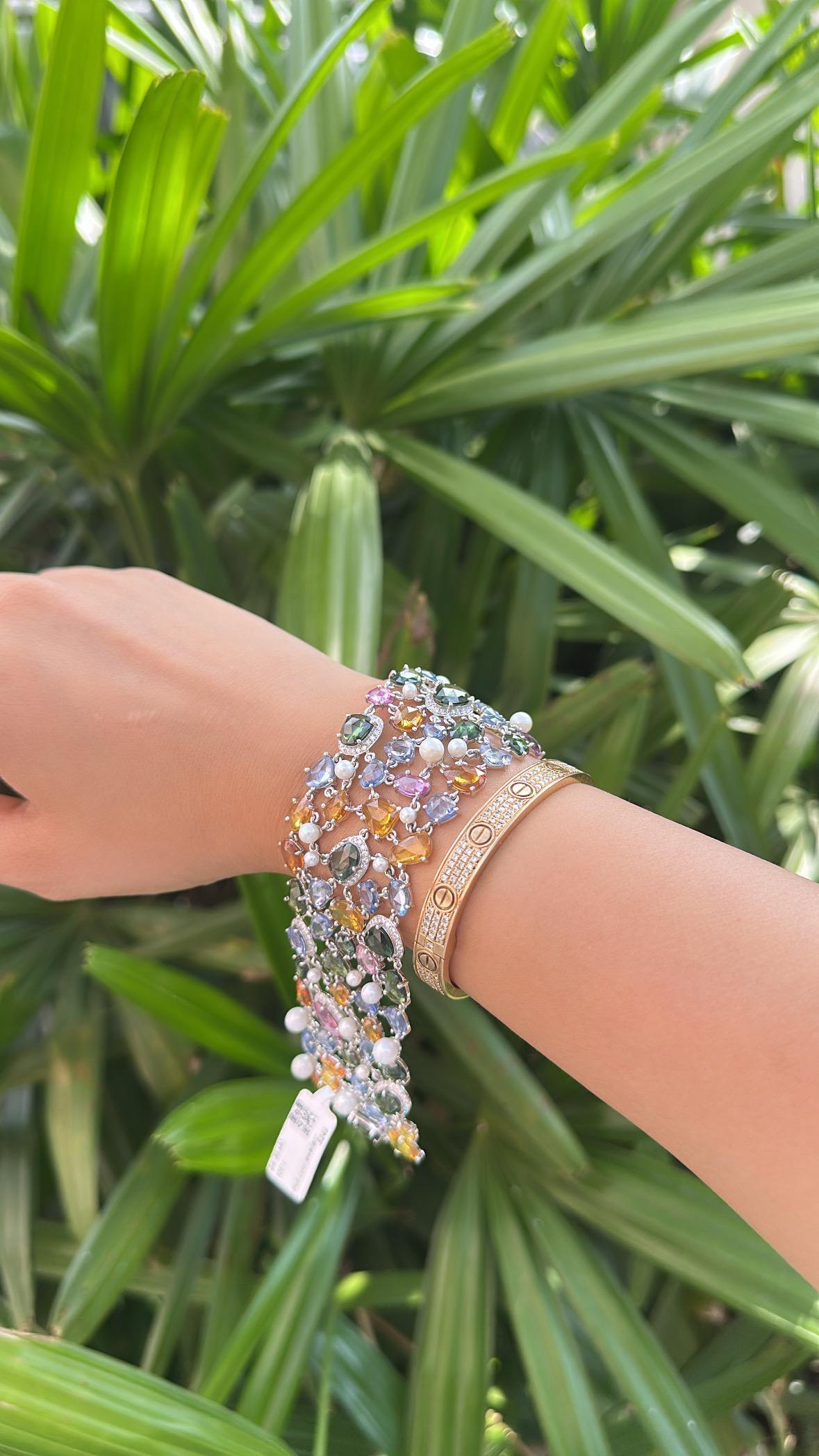 Bracelet à maillons en or 18 carats serti de plusieurs saphirs, perles et diamants de 68,39 carats en vente 6