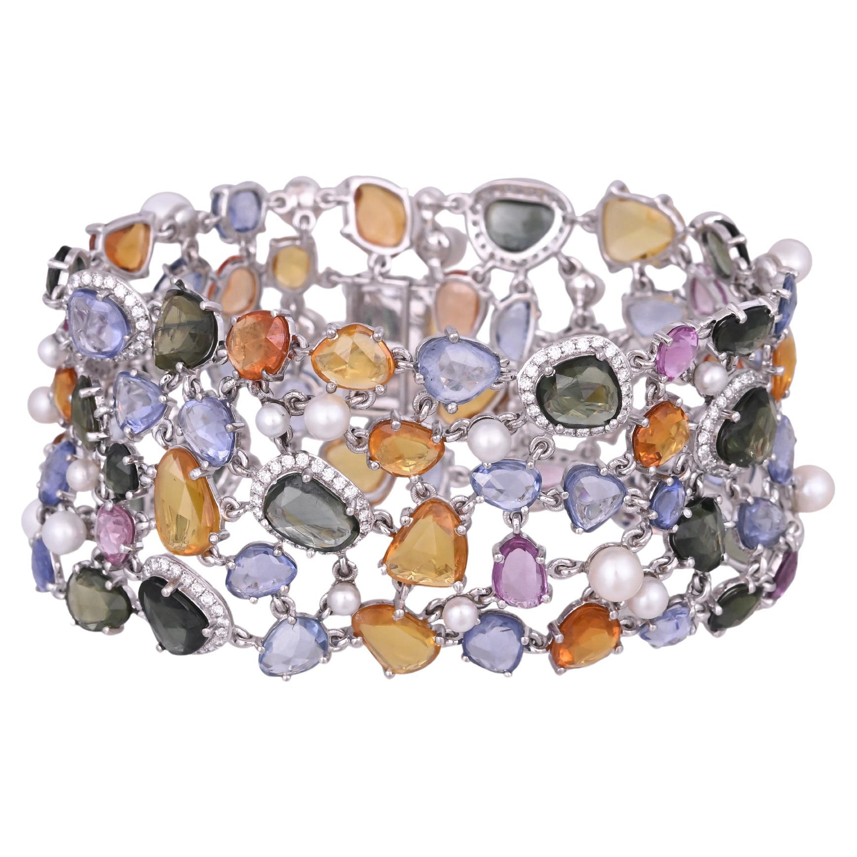 Bracelet à maillons en or 18 carats serti de plusieurs saphirs, perles et diamants de 68,39 carats