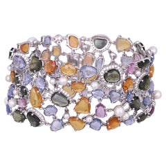 Bracciale in oro 18 carati, 68,39 carati con zaffiri multipli, perle e diamanti A Link