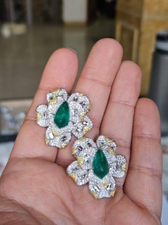 Set in 18K Gold, 6.95 carat, natural Emerald Sugarloafs & Diamonds Stud Earrings