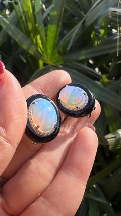 Set in 18K Gold, 7.35 carats Ethiopian Opal, Black Onyx & Diamonds Stud Earrings