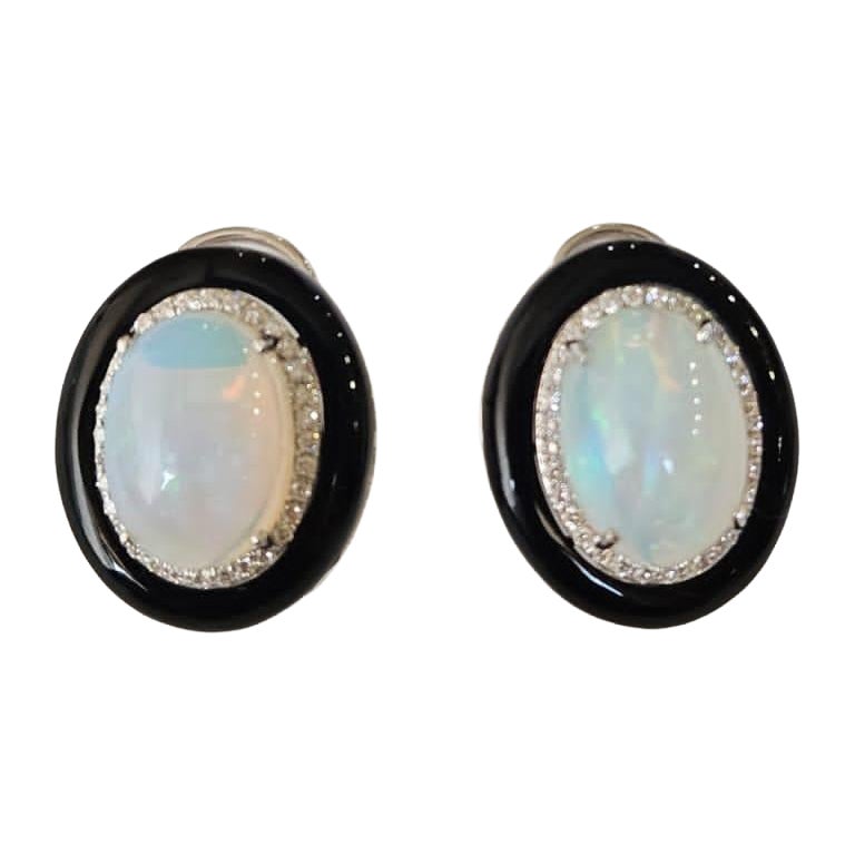 Set in 18K Gold, 7.35 carats Ethiopian Opal, Black Onyx 
Diamonds Stud Earrings For Sale