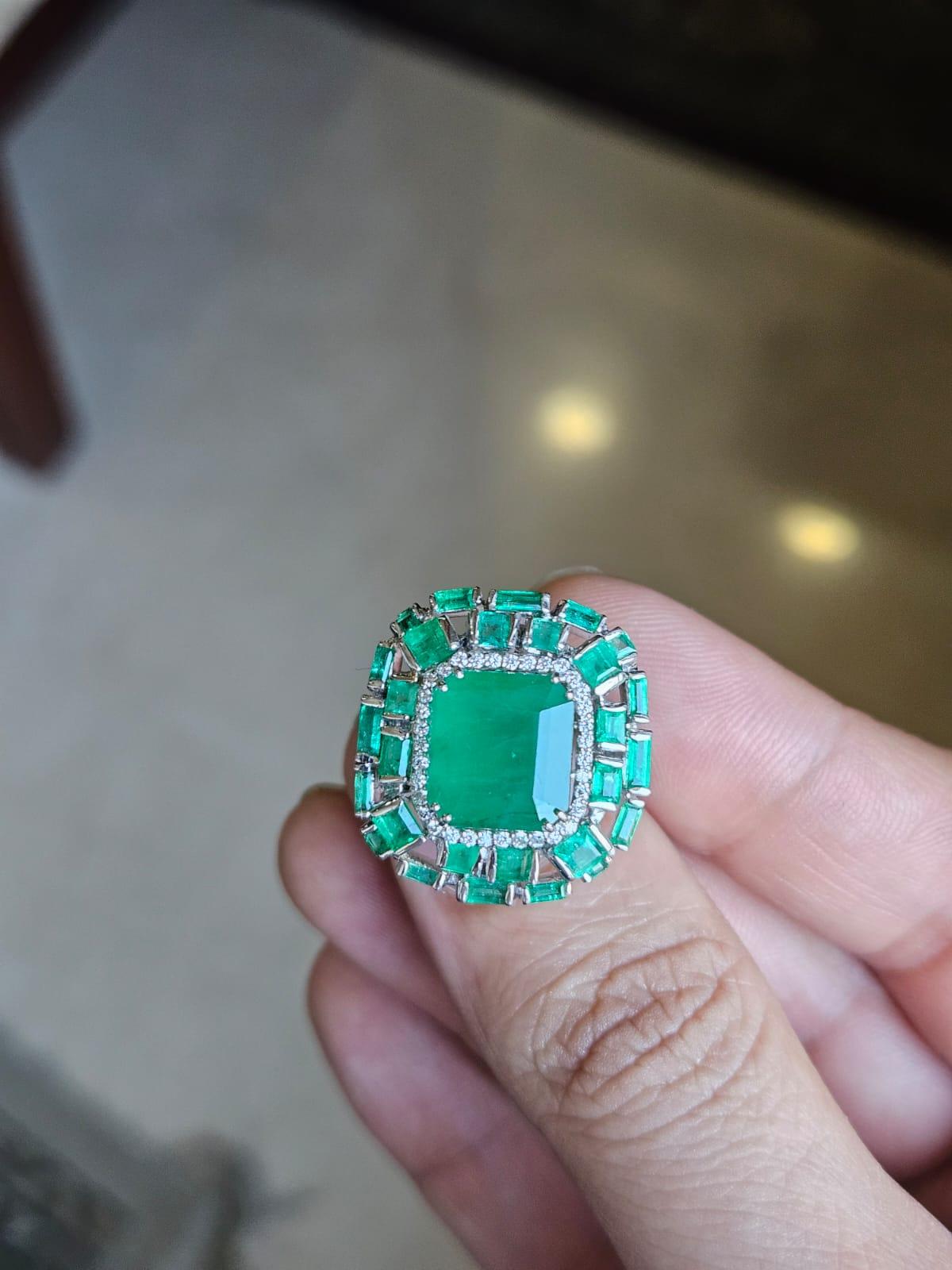 Emerald Cut Set in 18K Gold, 7.59 carats, natural Zambian Emerald & Diamonds Engagement Ring For Sale