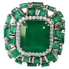 Set in 18K Gold, 7.59 carats, natural Zambian Emerald & Diamonds Engagement Ring