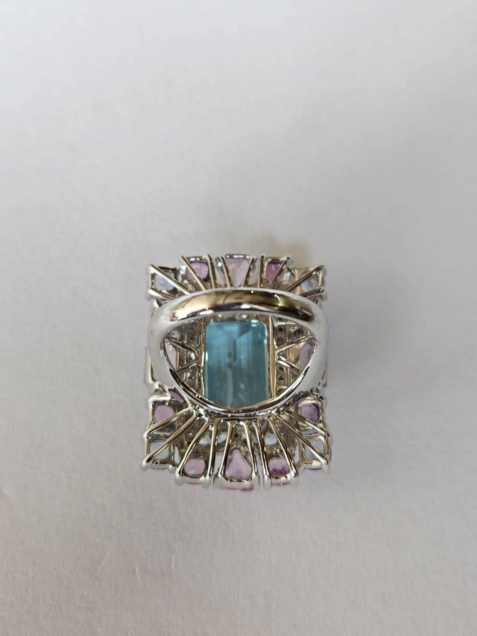Modern Set in 18K Gold, 7.97 carats Aquamarine, Multi Sapphires & Diamond Cocktail Ring For Sale