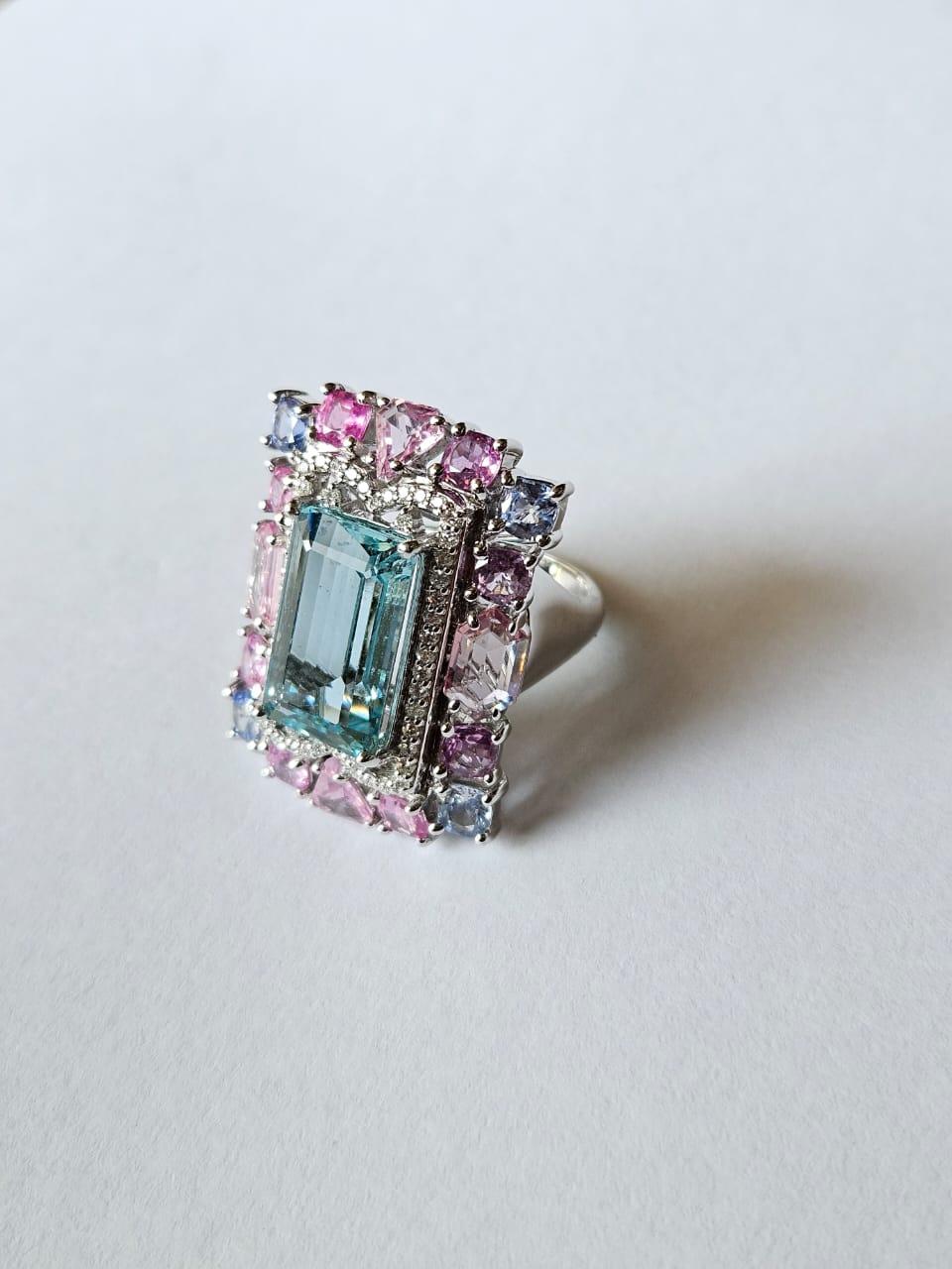 Emerald Cut Set in 18K Gold, 7.97 carats Aquamarine, Multi Sapphires & Diamond Cocktail Ring For Sale