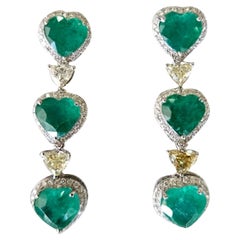 Set in 18K Gold, 8.26 carat, natural Zambian Emeralds
Diamonds Dangle Earrings Set in 18K Gold, 8.26 carat, natural Zambian Emeralds
Diamonds Dangle Earrings