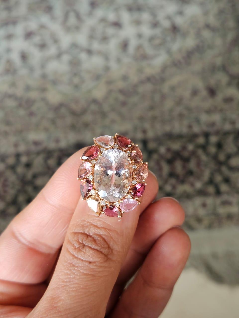 A very gorgeous and beautiful, Morganite & Tourmaline Cocktail Ring set in 18K Yellow Gold & natural Diamonds. The weight of the oval shaped Morganite is 8.47 carats. The weight of the Tourmaline is 4.50 carats. The Diamonds weight is 0.13 carats.