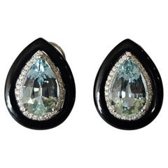 Set in 18K Gold, 8.54 carats, Aquamarine, Black Onyx & Diamonds Stud Earrings