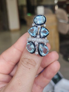 Bague cocktail en or 18 carats, aigue-marine 8,65 carats, émail noir et diamants