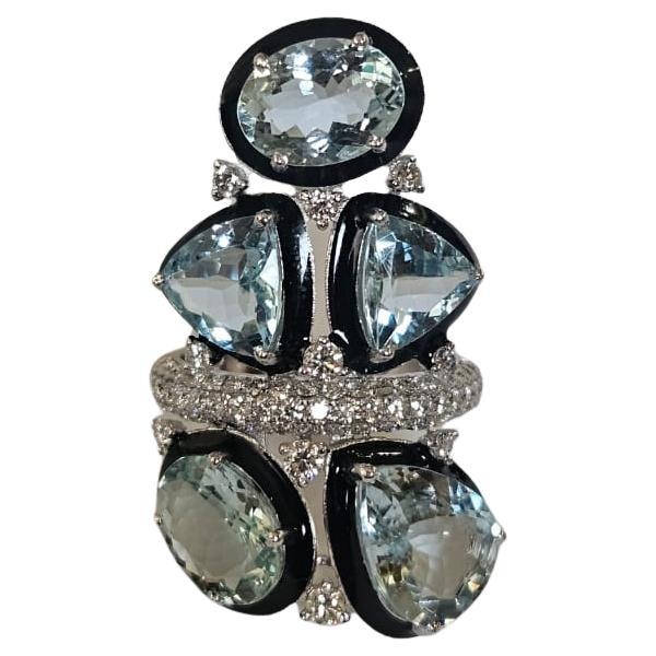 Set in 18K Gold, 8.65 carats Aquamarine, Black Enamel 
Diamonds Cocktail Ring For Sale