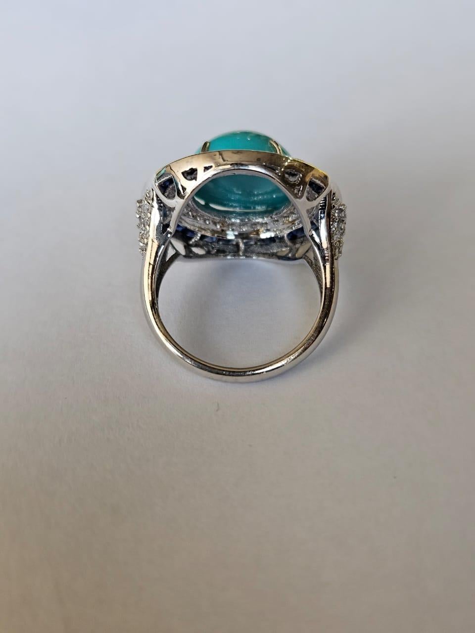 Cabochon Set in 18K Gold, 8.65 carats Turquoise, Blue Sapphires & Diamonds Cocktail Ring For Sale