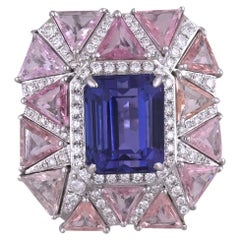 Set in 18K Gold, 8.68 carats Tanzanite, Multi Sapphires 
Diamonds Cocktail Ring