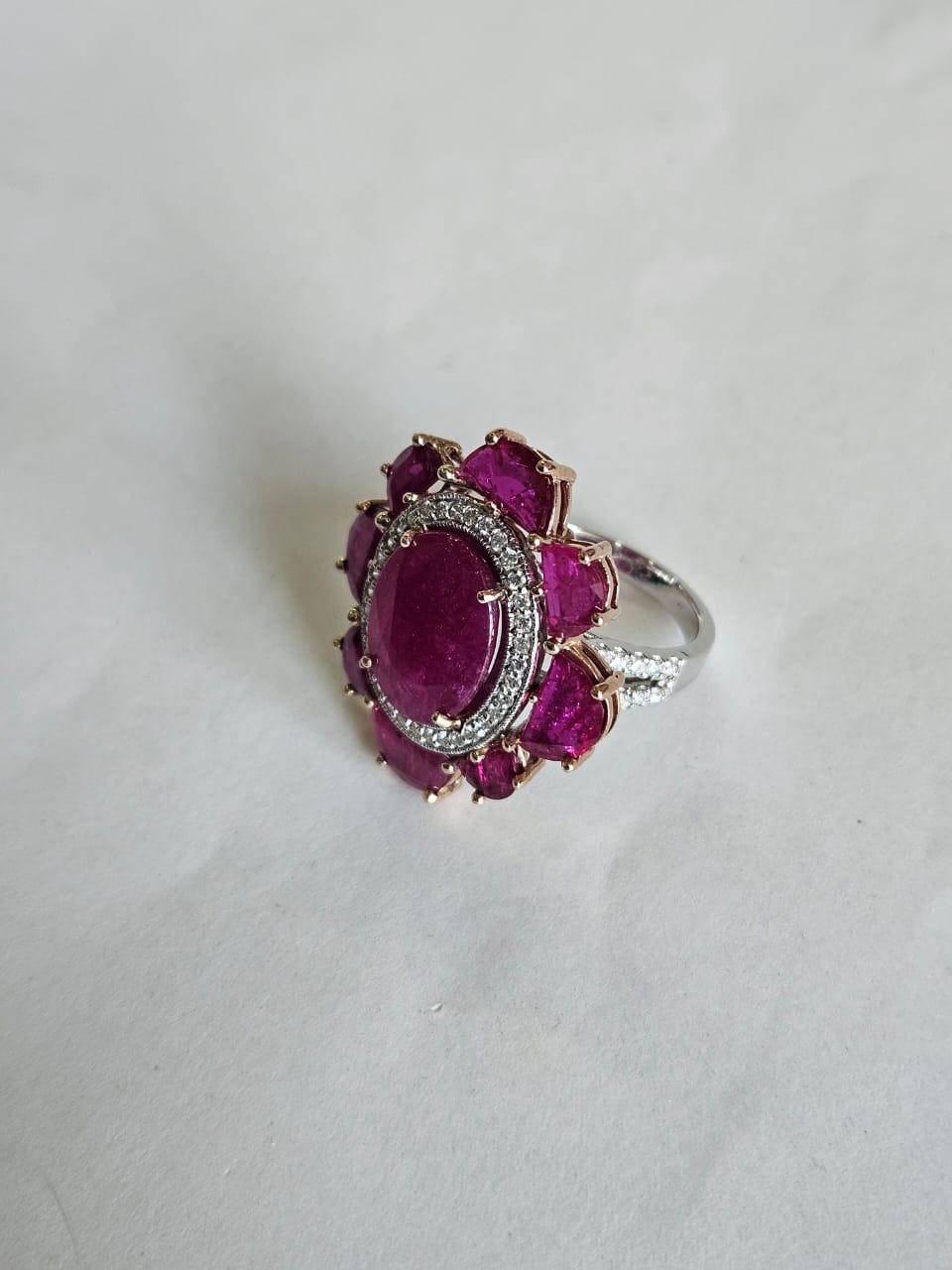 Oval Cut Set in 18K Gold, 8.83 carats, natural Mozambique Ruby & Diamonds Cocktail Ring For Sale
