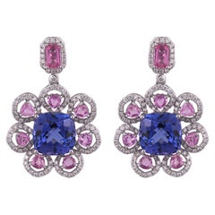 Set in 18K Gold, 9.11 carats Tanzanite, Pink Sapphires 
Diamond Dangle Earrings