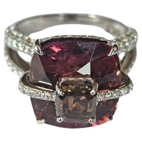 A very gorgeous and beautiful, one of a kind, Tourmaline Cocktail Engagement Ring set in 18K White Gold & Diamonds. The weight of of the Tourmaline is 9.82 carats. The combined Diamonds weight is 2.42 carats. Net 18K White Gold weight is 5.47 grams.