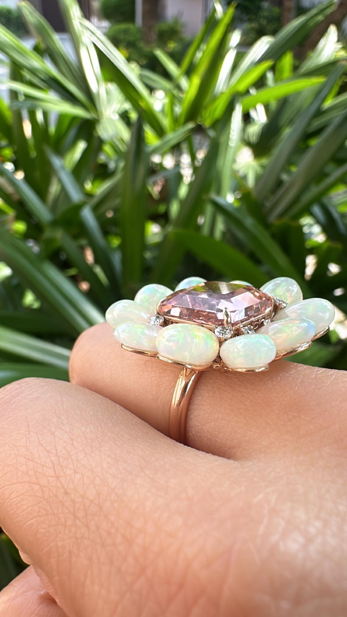 A very gorgeous and beautiful, Opal & Tourmaline Cocktail Ring set in 18K Rose Gold & natural Diamonds. The weight of the Tourmaline is 9.87 carats. The weight of the Ethiopian Opal is 13.55 carats. The Diamonds weight is 0.28 carats. Net 18K Rose