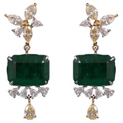 Set in 18k Gold, 9.88 Carats, Zambian Emerald
Yellow Diamonds Dangle Earrings Set in 18k Gold, 9.88 Carats, Zambian Emerald
Yellow Diamonds Dangle Earrings