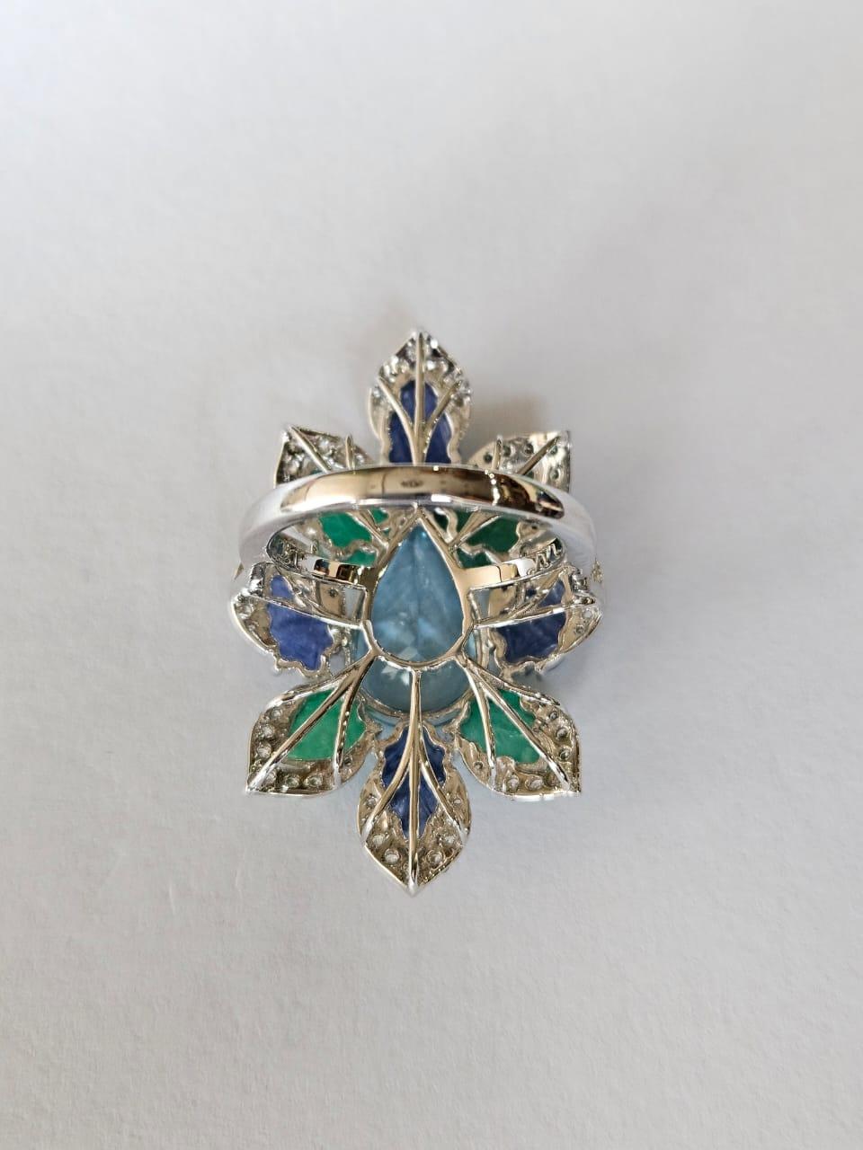 Modern Set in 18K Gold, Aquamarine, Blue Sapphires, Emeralds & Diamonds Cocktail Ring For Sale