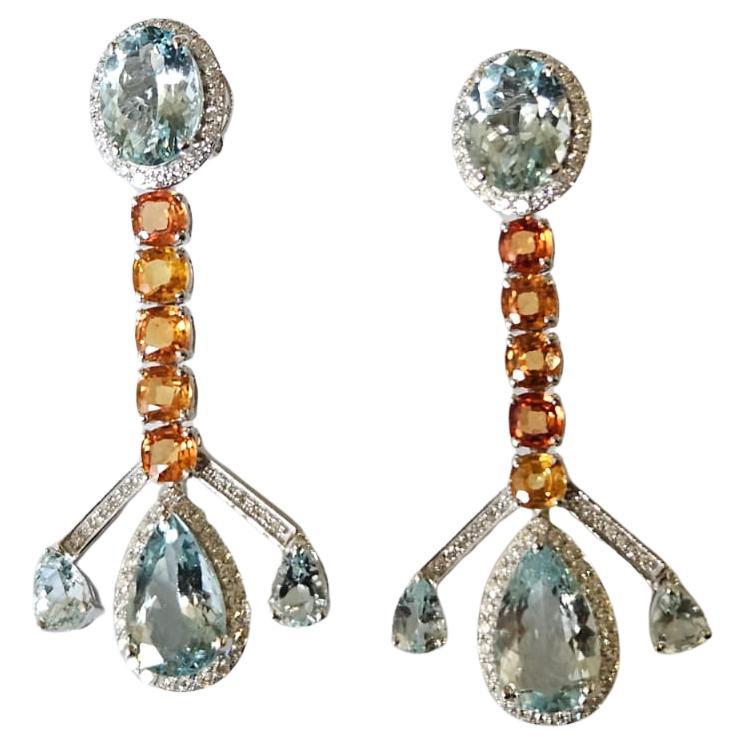 Orecchini pendenti in oro 18 carati, acquamarine, zaffiri gialli e diamanti
