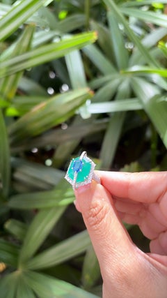 Set in 18K Gold, Blue Sapphire, Emerald & Diamonds "Kissing" Engagement Ring