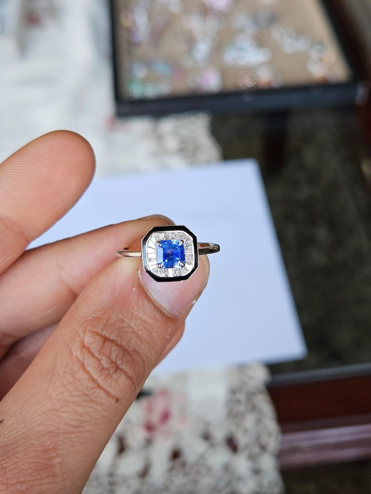 A very gorgeous and beautiful, Blue Sapphire & Black Enamel Engagement Ring set in 18K White Gold & natural Diamonds. The weight of the Blue Sapphire is 0.68 carats. The Blue Sapphire is of Ceylon (Sri Lankan) origin. The Diamonds weight is 0.22