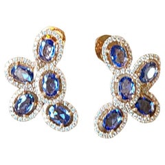 Set in 18K Gold, Carats Blue Sapphire Ovals & Diamonds Stud Earrings