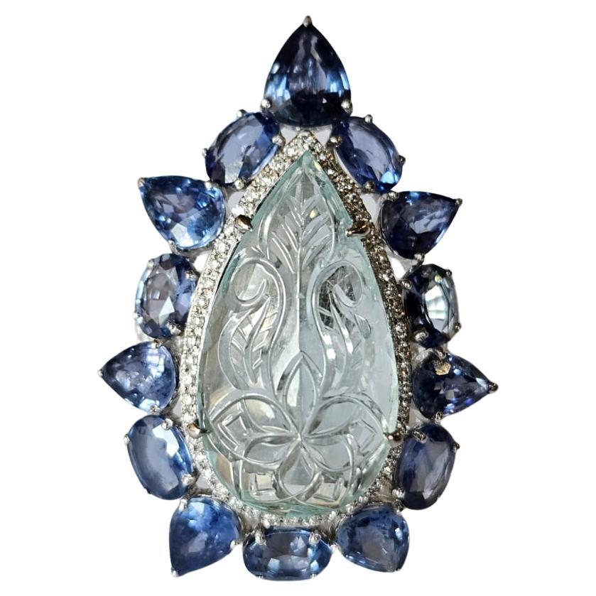 Set in 18K Gold, carved Aquamarine, Blue Sapphires & Diamonds Cocktail Ring