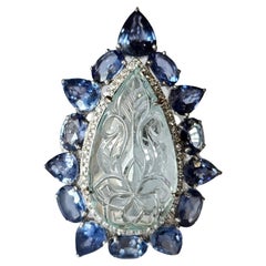 Set in 18K Gold, carved Aquamarine, Blue Sapphires & Diamonds Cocktail Ring