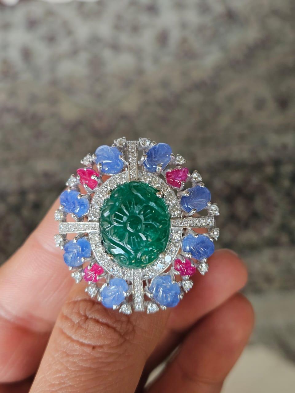 Round Cut Set in 18K Gold, carved Emerald, Blue Sapphires, Rubies & Diamonds Cocktail Ring For Sale