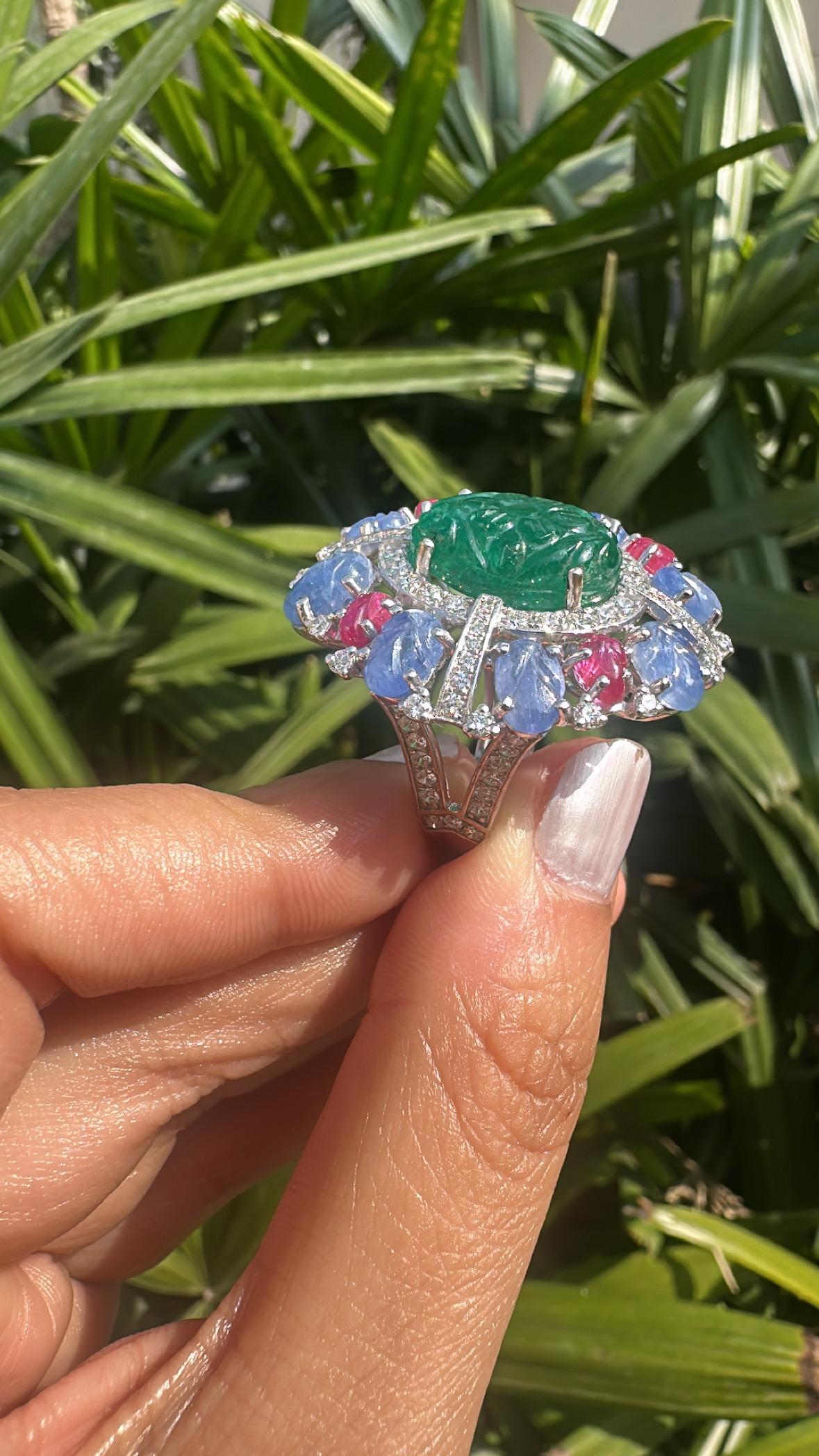 Set in 18K Gold, carved Emerald, Blue Sapphires, Rubies & Diamonds Cocktail Ring For Sale 1