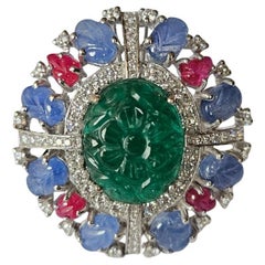 Set in 18K Gold, carved Emerald, Blue Sapphires, Rubies & Diamonds Cocktail Ring