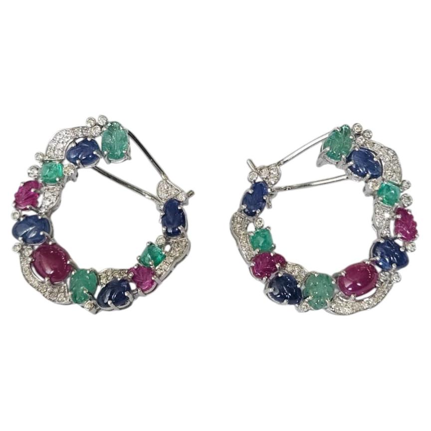 Set in 18K Gold, carved Emeralds, Blue Sapphires, Ruby & Diamonds Hoop Earrings For Sale