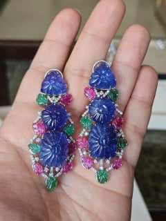 Set in 18K Gold, carved Tanzanites, Emerald, Ruby & Diamonds Chandelier Earrings