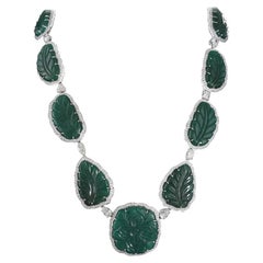 Set in 18k Gold, Carved Zambian Emerald and Fancy Diamonds Necklace and Earrings