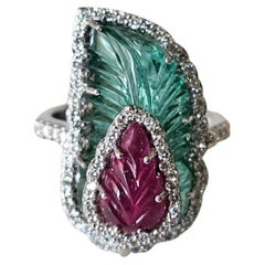 Set in 18K Gold, carved Zambian Emerald, carved Ruby & Diamonds Cocktail Ring