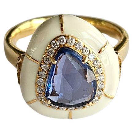 Set in 18K Gold, Ceylon Blue Sapphire, White Enamel & Diamonds Engagement Ring For Sale