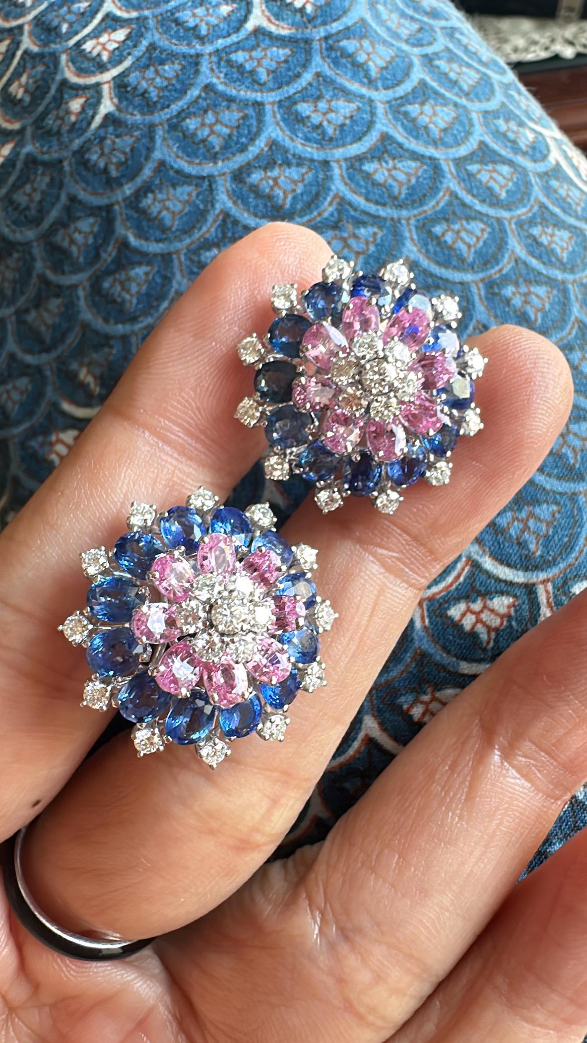 A very gorgeous and beautiful, modern style, Blue Sapphires & Pink Sapphires Stud Earrings set in 18K White Gold & natural Diamonds. The weight of of the Blue Sapphires is carats. The weight of the Pink Sapphires is carats. The Blue and Pink