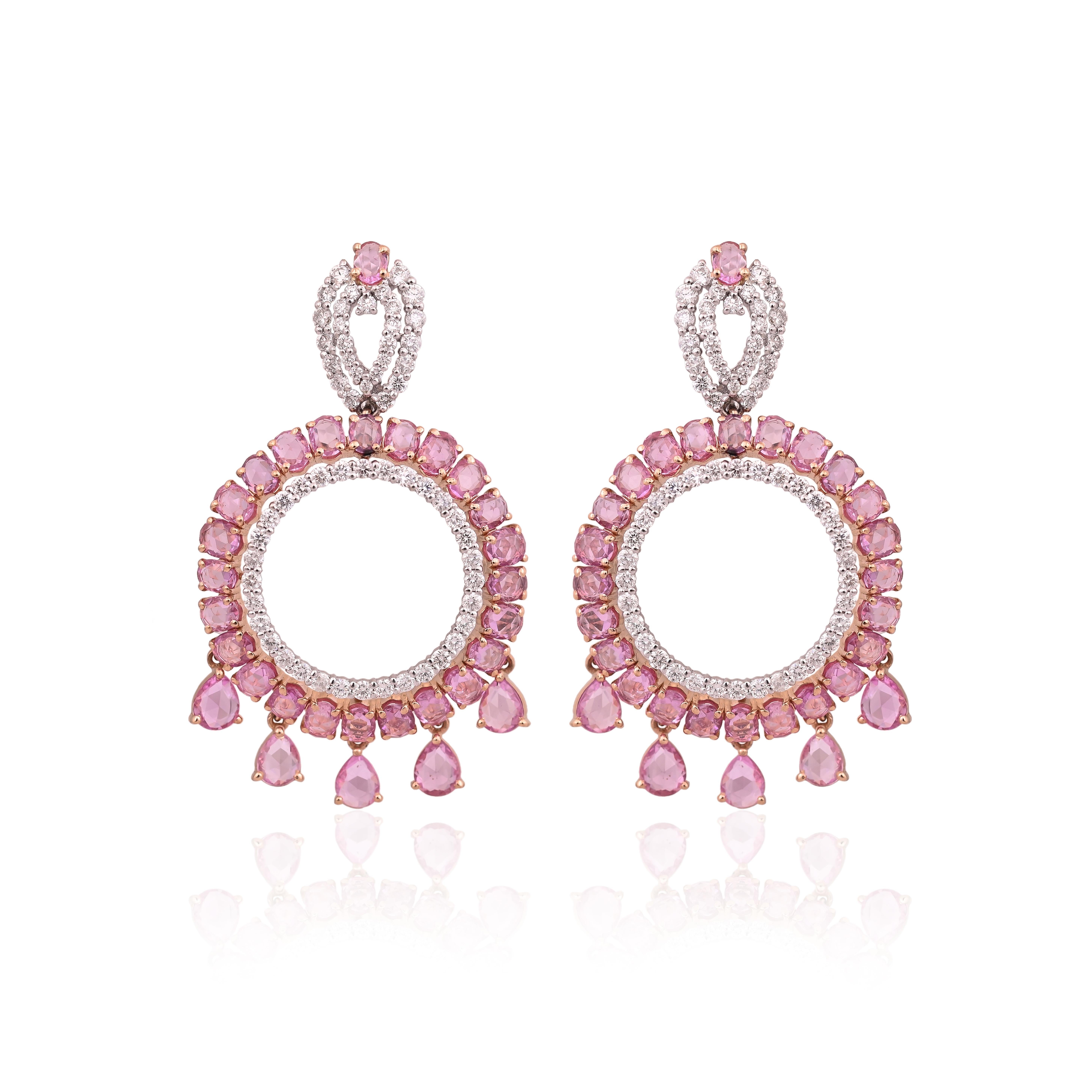 A very gorgeous and beautiful, Pink Sapphire Chandelier Earrings set in 18K White Gold & Diamonds. The weight of the Pink Sapphire Rose Cuts is 11.31 carats. The Pink Sapphires are of Ceylon (Sri Lanka) origin. The Diamonds weight is 2.35 carats.