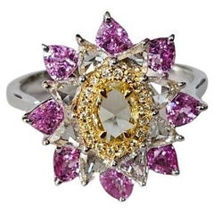Set in 18K Gold, Ceylon Pink Sapphires 
Yellow Rose Cut Diamond Engagement Ring